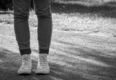 Low section of man standing on floor