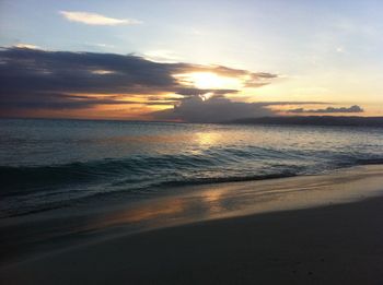 Scenic view of sea at sunset