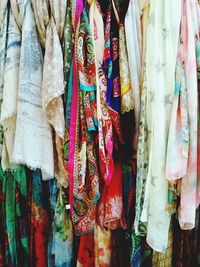 Full frame of scarf and shawls for sale on market street