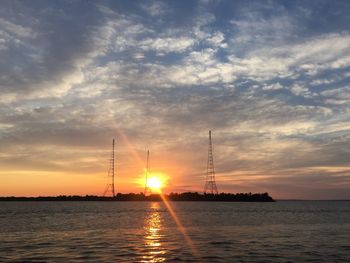 Scenic view of sea against romantic sky