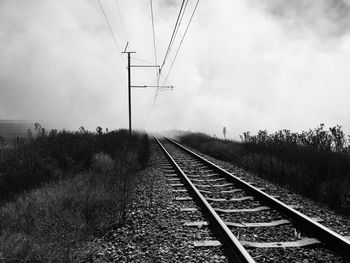 Railroad tracks against sky