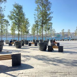 Lounge chairs against clear blue sky