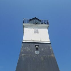 Low angle view of built structure against blue sky