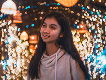 Portrait of smiling young woman