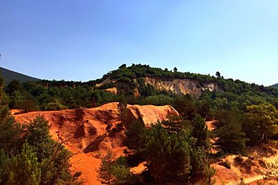 Scenic view of rocky mountains against clear sky