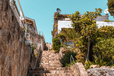 Charming old architecture on a coastal city in spain. stone made buildings and stairs