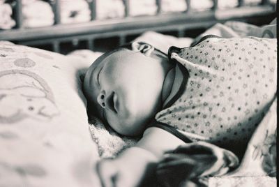 Boy sleeping in bed