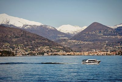 Scenic view of sea with mountains in background