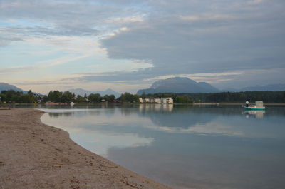 View of lake against cloudy sky