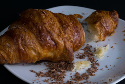 Close-up of croissant in plate