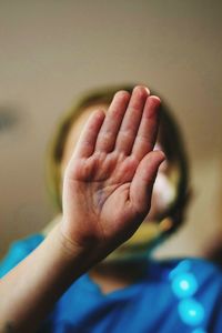 Close-up of woman hand on finger