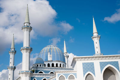 Beautiful mosque with blue dome and minaret