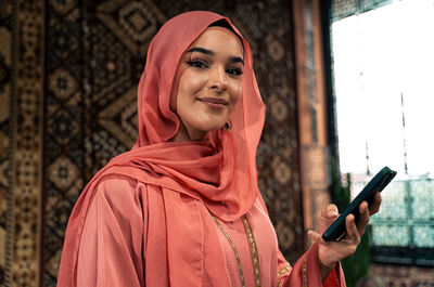 Young woman using mobile phone