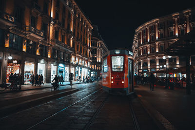 Illuminated street at night