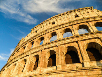 Low angle view of colosseum in rome against sky