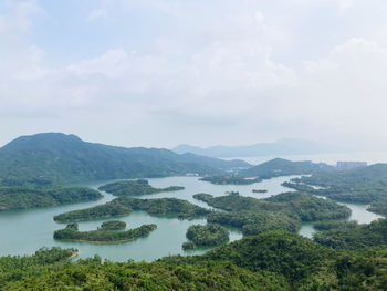 Scenic view of tai lam chun reservoir against sky