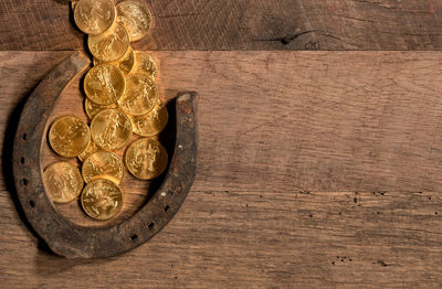 High angle view of coins on table