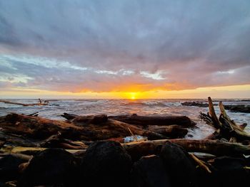 Scenic view of sea against sky during sunset