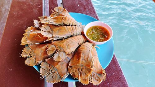 High angle view of fish in plate on table