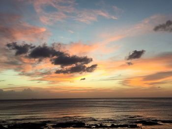 Scenic view of sea at sunset