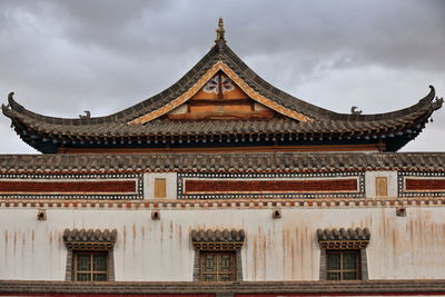 Low angle view of temple building against sky