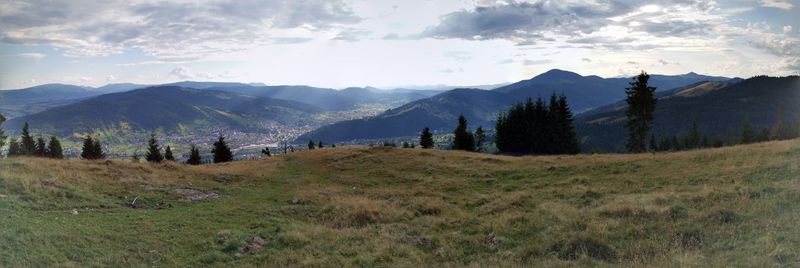 Panoramic view of landscape and mountains against sky