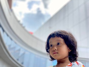 Portrait of cute boy looking away