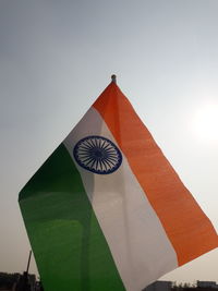 Low angle view of flag against clear sky