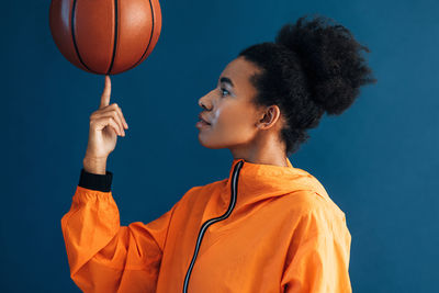 Man holding basketball hoop