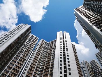 Low angle view of modern buildings against sky