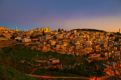  old city. east quarter. muslim quarter, panoramic top view at blue hour at sunset.