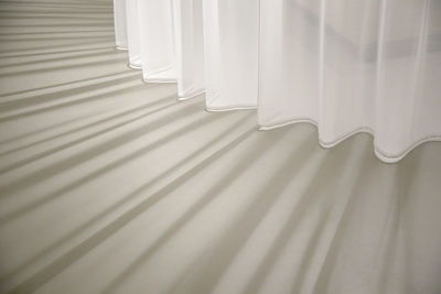 High angle view of white curtain