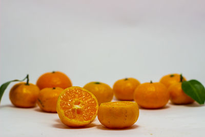 Close-up of orange fruits on table