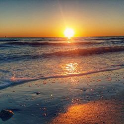 Scenic view of sea at sunset