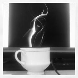 Close-up of coffee cup on table