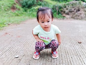 Portrait of cute girl looking away