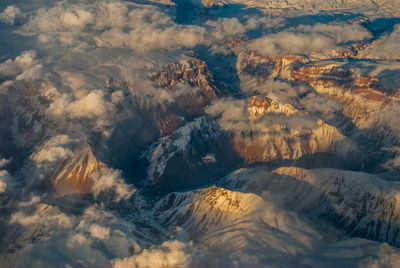 Aerial view of majestic mountains against sky