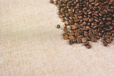 Close-up of coffee beans on table