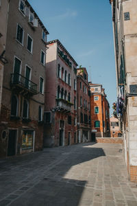 Narrow alley along buildings