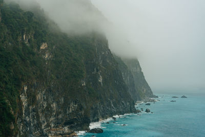 Scenic view of sea and mountains