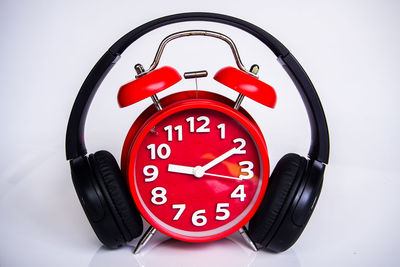 Close-up of clock against white background