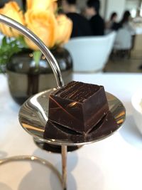 Close-up of chocolate cake on table