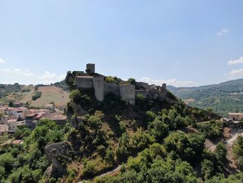 View of fort on mountain against sky