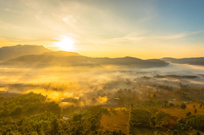 Scenic view of landscape against sky during sunset