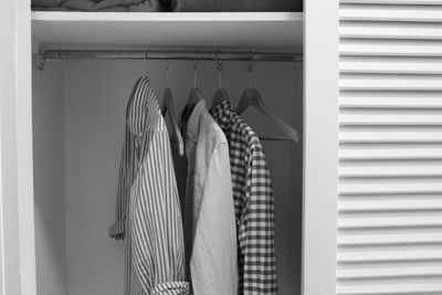 Clothes hanging on rack at home