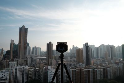 Modern buildings in city against sky