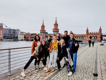 Group of people walking in front of building