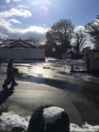 People on snow covered landscape