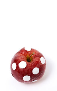 Close-up of donut against white background