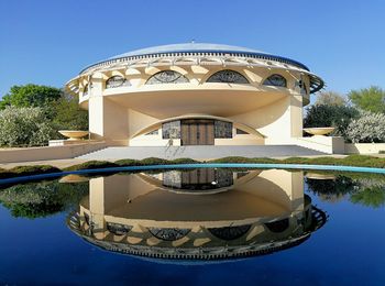 View of swimming pool against blue sky
